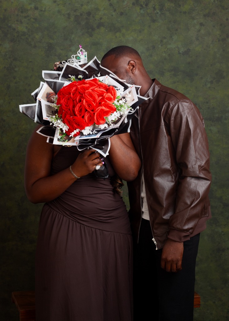 Wisdom and Similoluwa with roses
